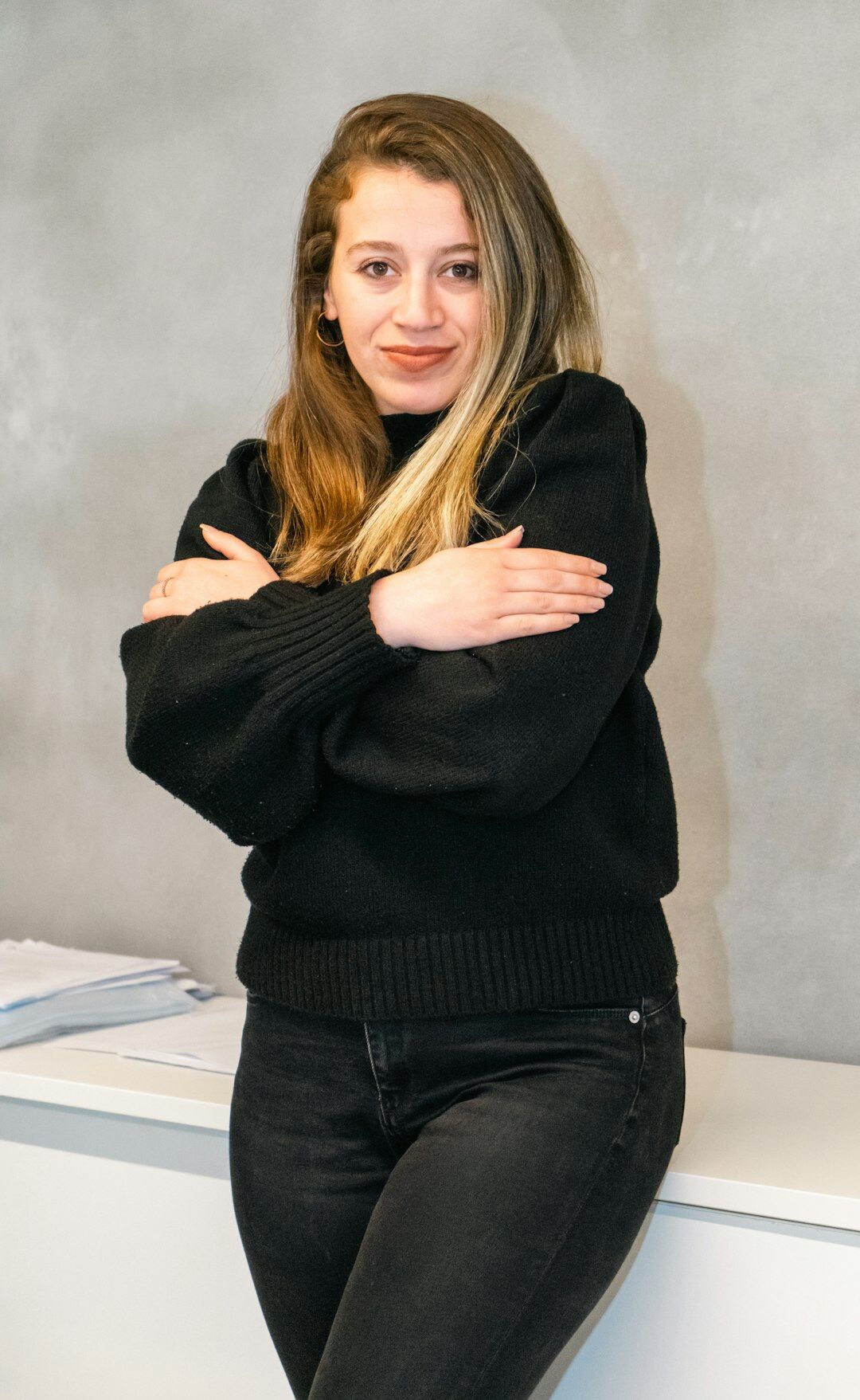 Studio portrait of a Nordic woman broadcast producer smiling